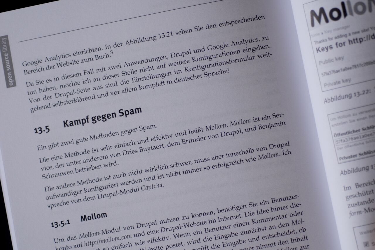 A book page discussing spam prevention in Drupal, highlighting the Mollom service as an effective solution.