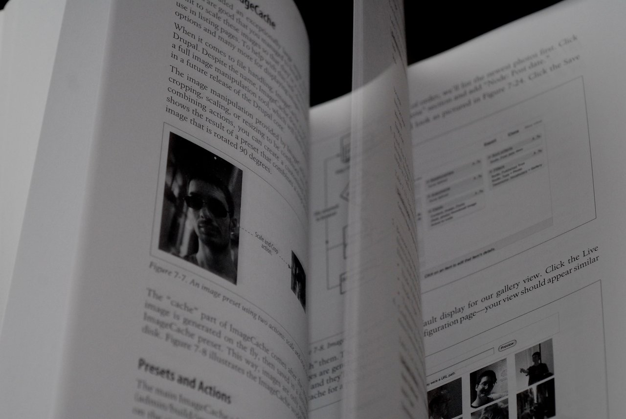 A book about using Drupal, with pages showing text, images, and diagrams related to image processing and presets.