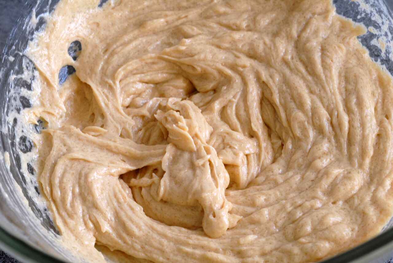 A bowl filled with smooth, mixed cookie dough, ready for the next step in baking.