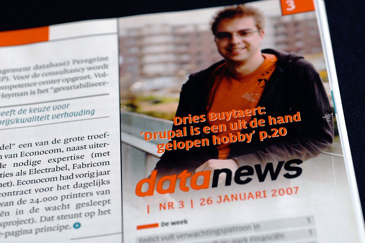 Magazine page featuring an article about Drupal with a photo of a smiling person wearing an orange shirt.