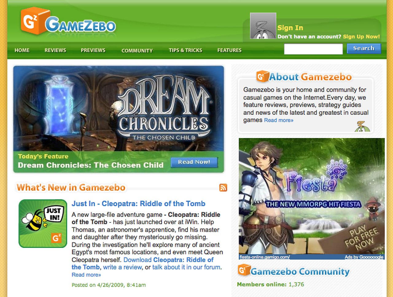 A gaming website homepage featuring reviews, previews, and community discussions, with a highlighted article on *Dream Chronicles: The Chosen Child*.