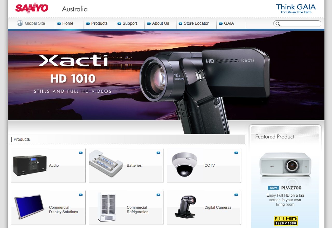 Screenshot of a Sanyo Australia webpage featuring the Xacti HD 1010 camcorder, product categories, and a featured projector.