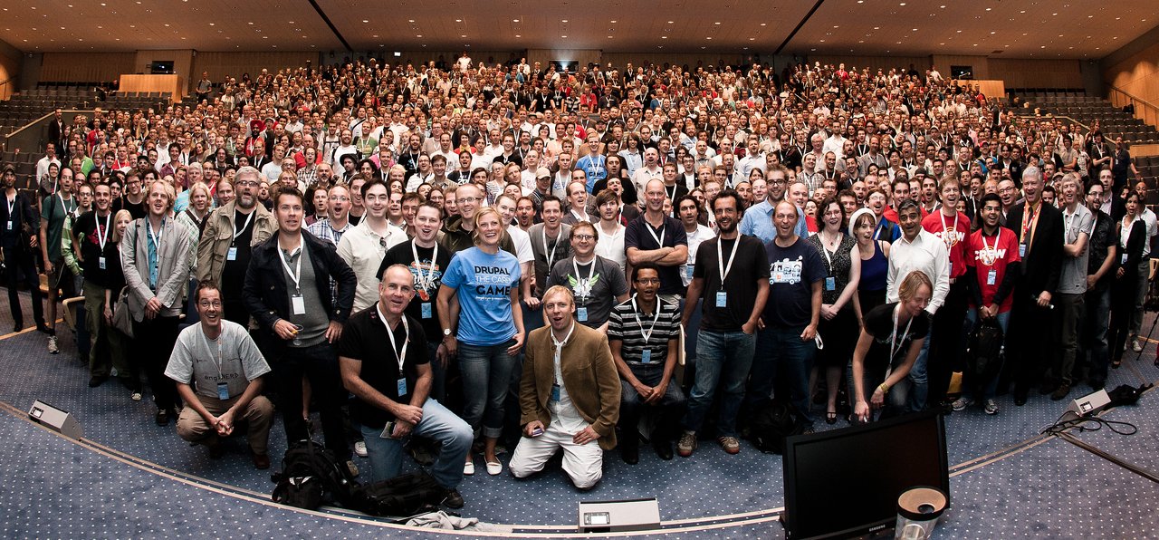 A large group of people posing together for a group photo at DrupalCon Copenhagen 2010.