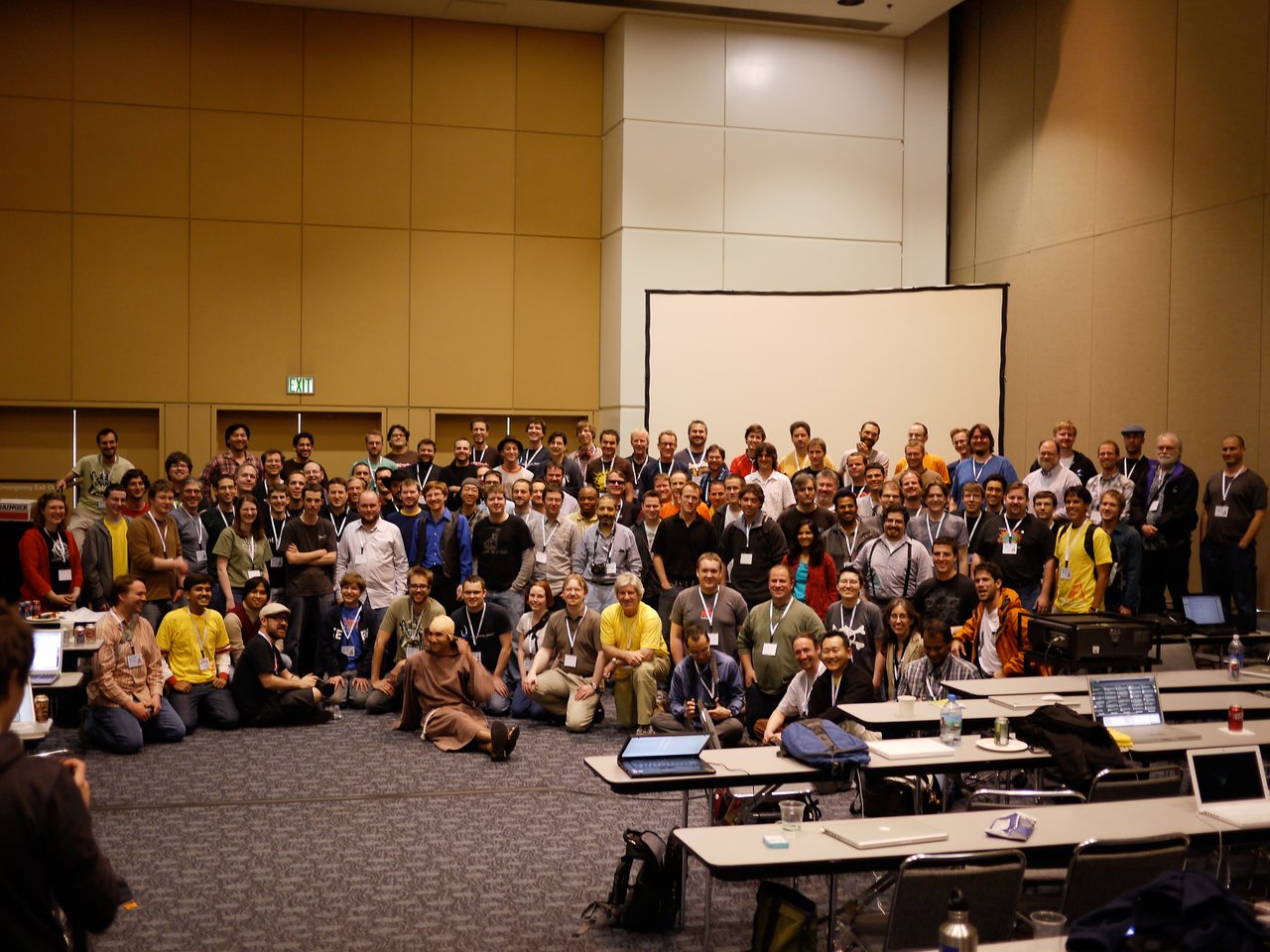 A large group of Drupal core developers poses for a group photo at the Core Developer Summit during DrupalCon 2010.