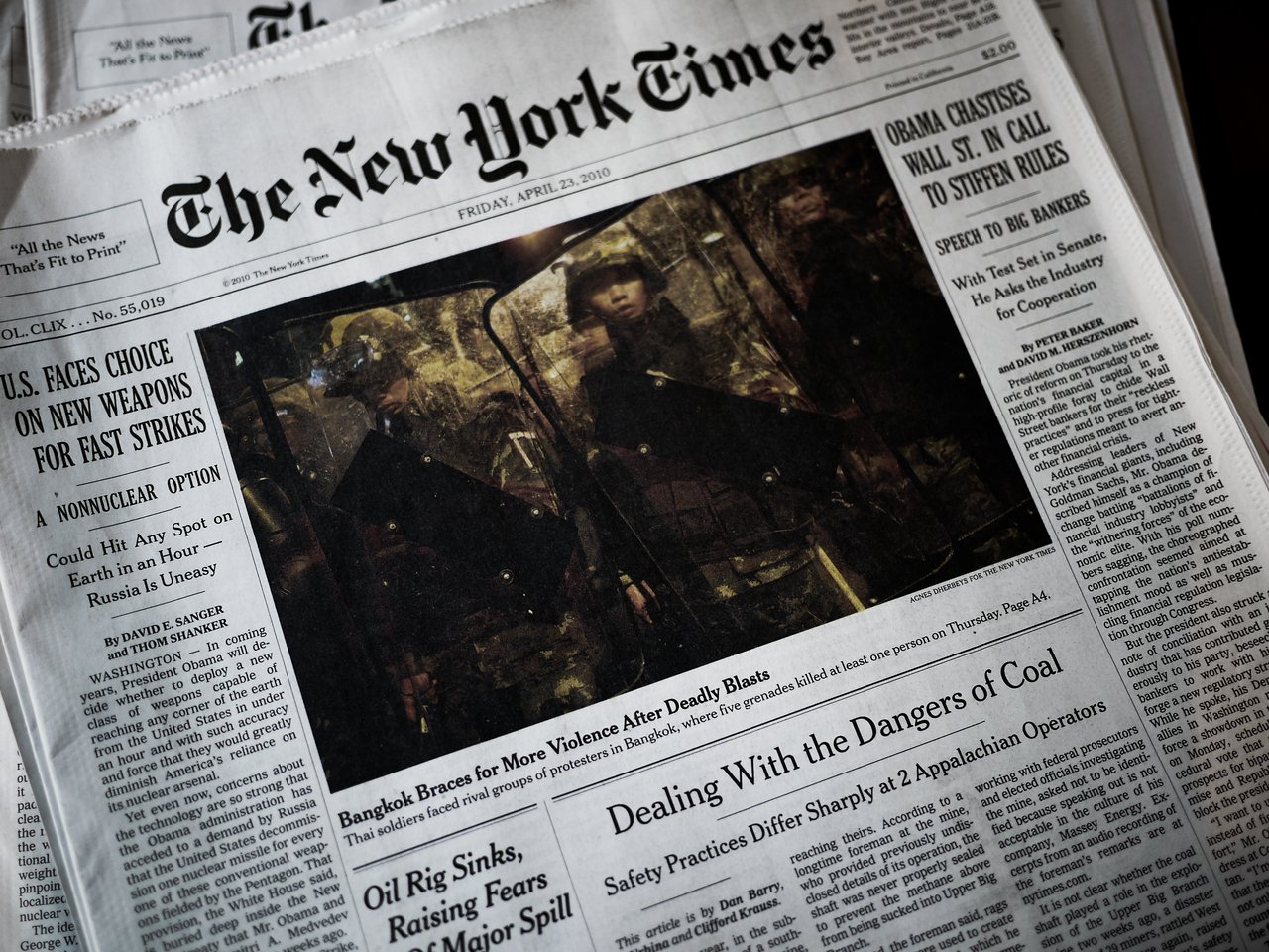 A copy of The New York Times newspaper from April 23, 2010, featuring headlines on politics, military, and energy.
