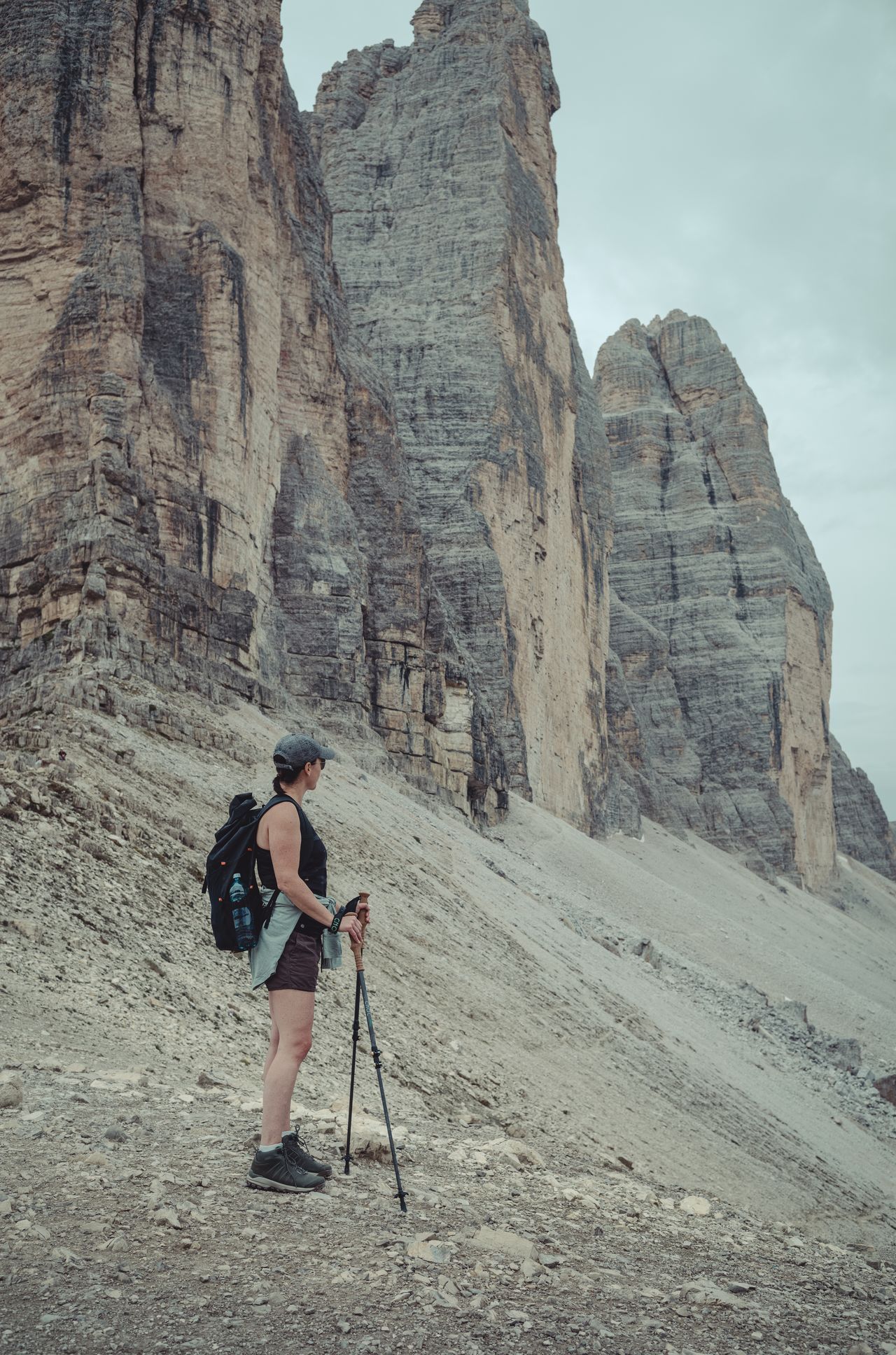 Vanessa standing in front of three giant mountain peaks.