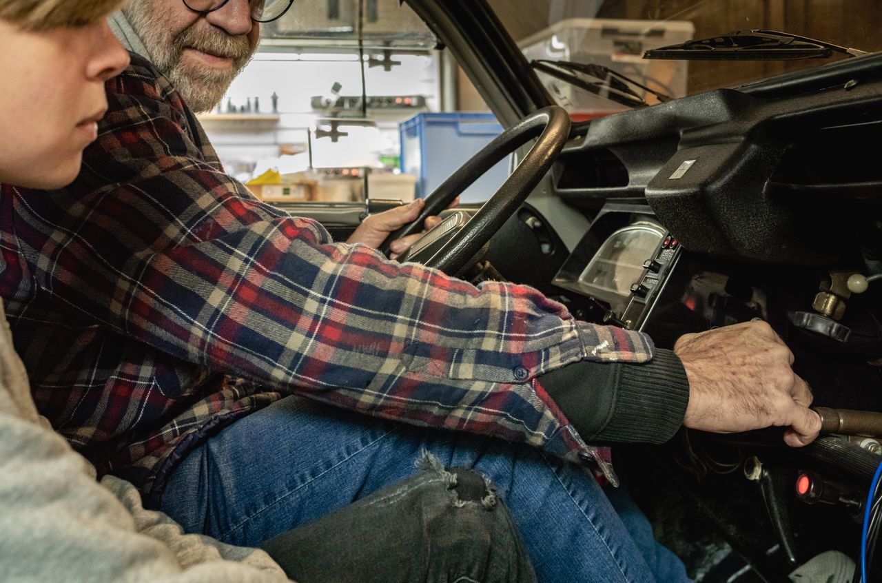 Opa showing Stan how to use the kludge of his Citroën 2CV.