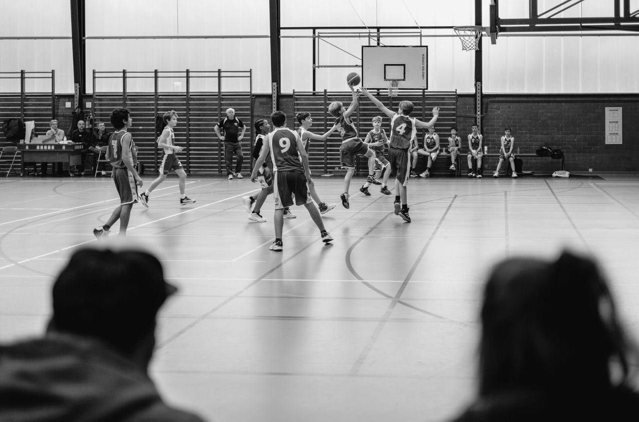 Kids playing basketball.
