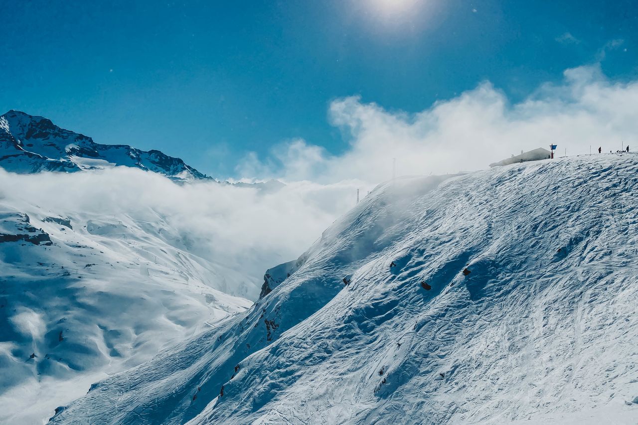 Snow-covered mountain slope.