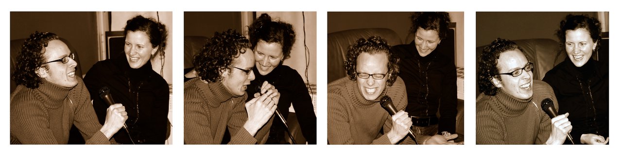 Two people singing karaoke together, laughing and enjoying the moment while holding microphones.