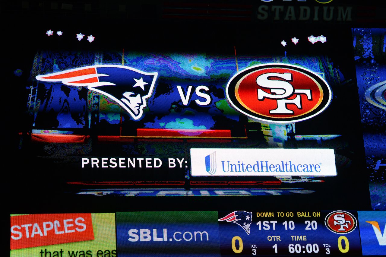 Scoreboard showing New England Patriots vs.