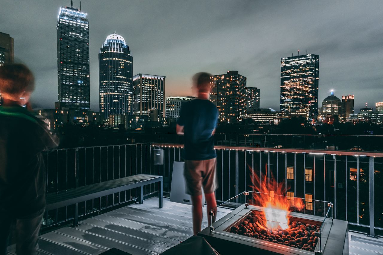 Axl staring at the Boston skyline, waiting for the Fourth of July fireworks to start.