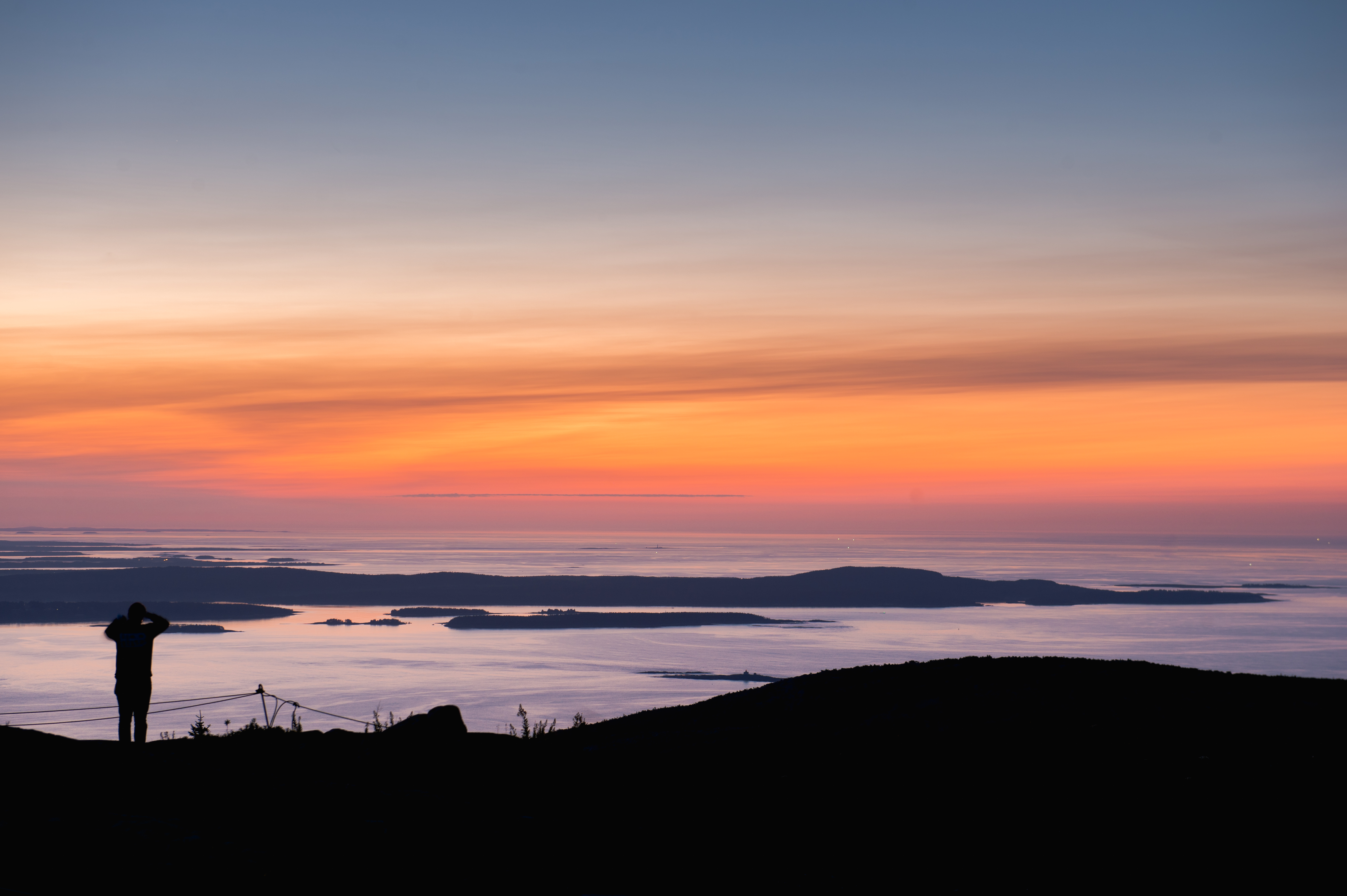 A sunrise with beautiful reds and black silhouettes