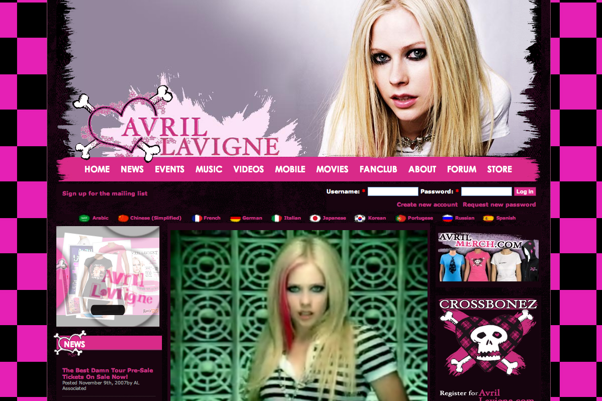 A website featuring Avril Lavigne with a banner image, merchandise, and a video still of her performing.