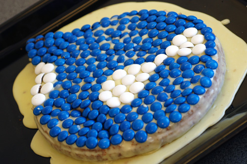 A finished cake the shape of Druplicon