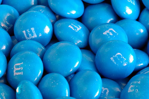 A close-up of blue m&amp;m's only