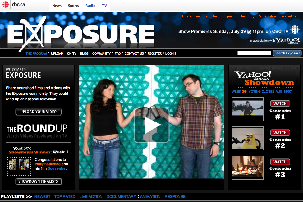 A man and woman stand in front of a patterned background, extending their hands toward each other.