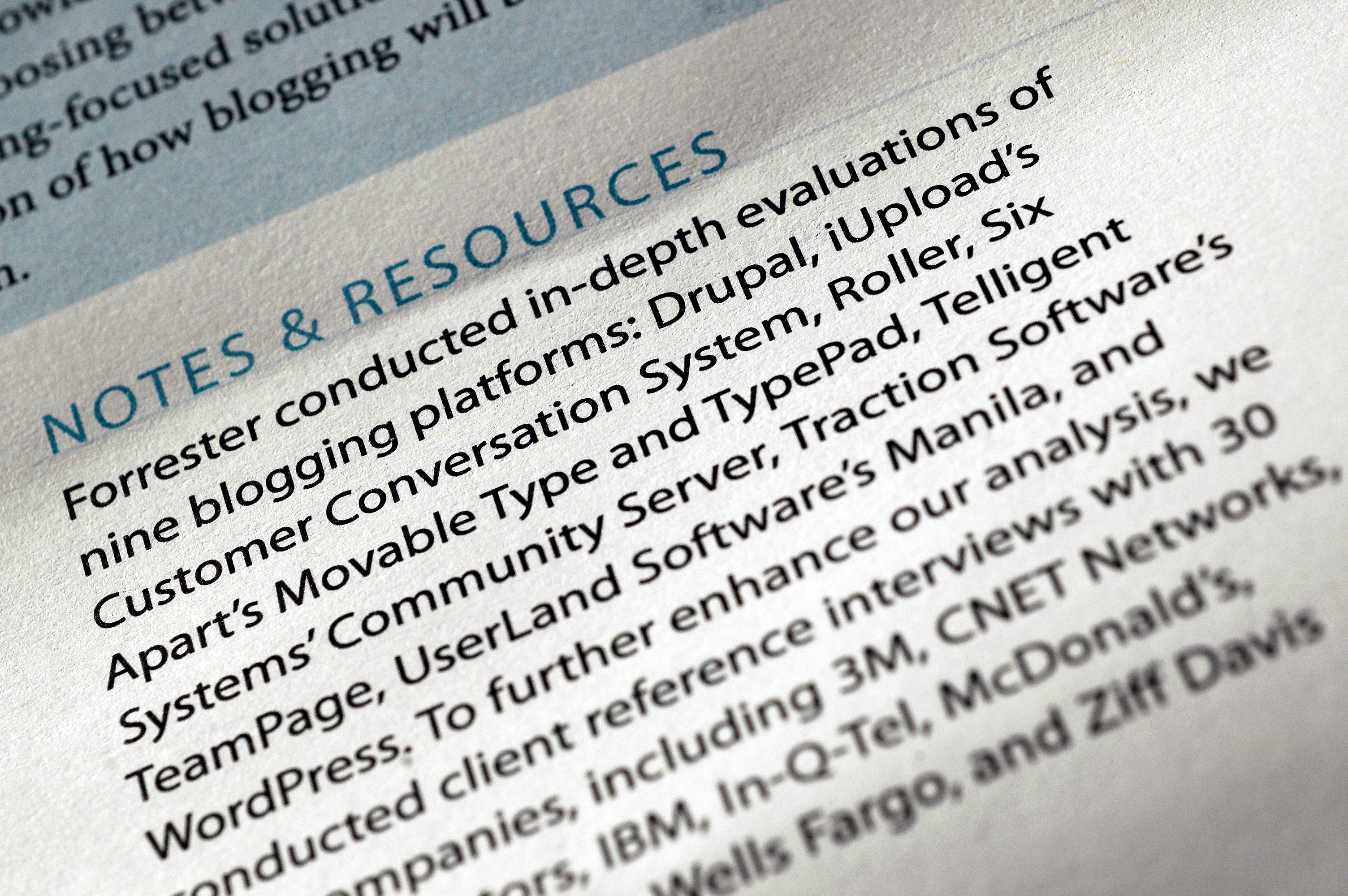 Close-up of a Forrester report evaluating blogging platforms, including Drupal, WordPress, and Movable Type.