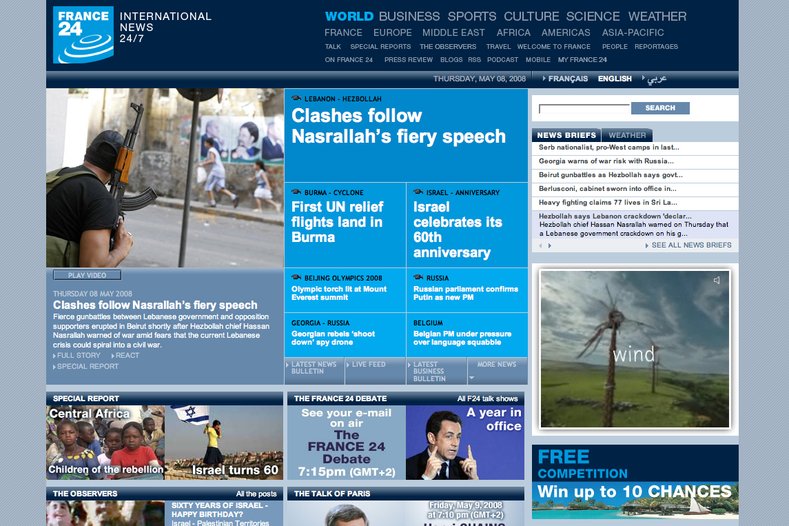 A news website homepage displaying headlines about global events, including clashes in Lebanon, Israel's anniversary, and Burma relief efforts.
