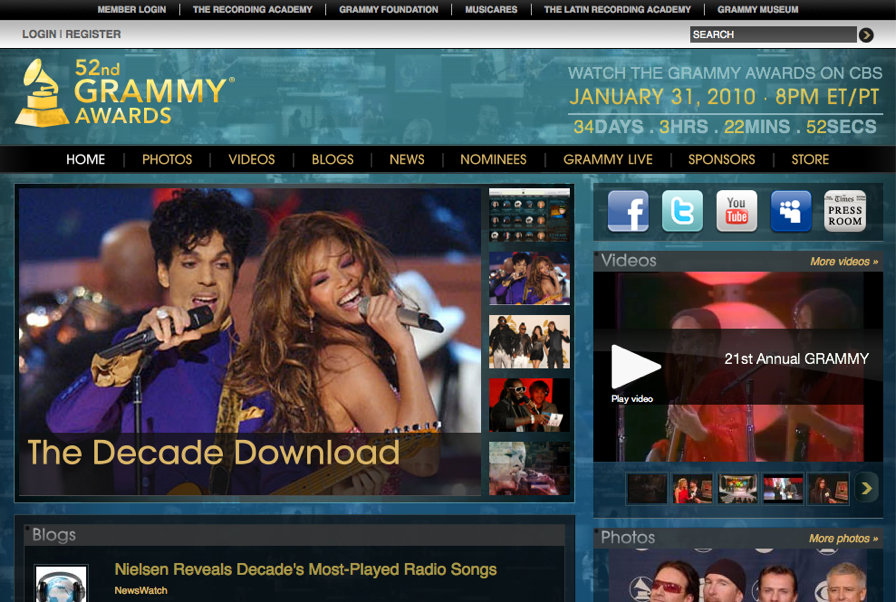 Screenshot of the 52nd Grammy Awards website featuring two singers performing on stage with microphones.
