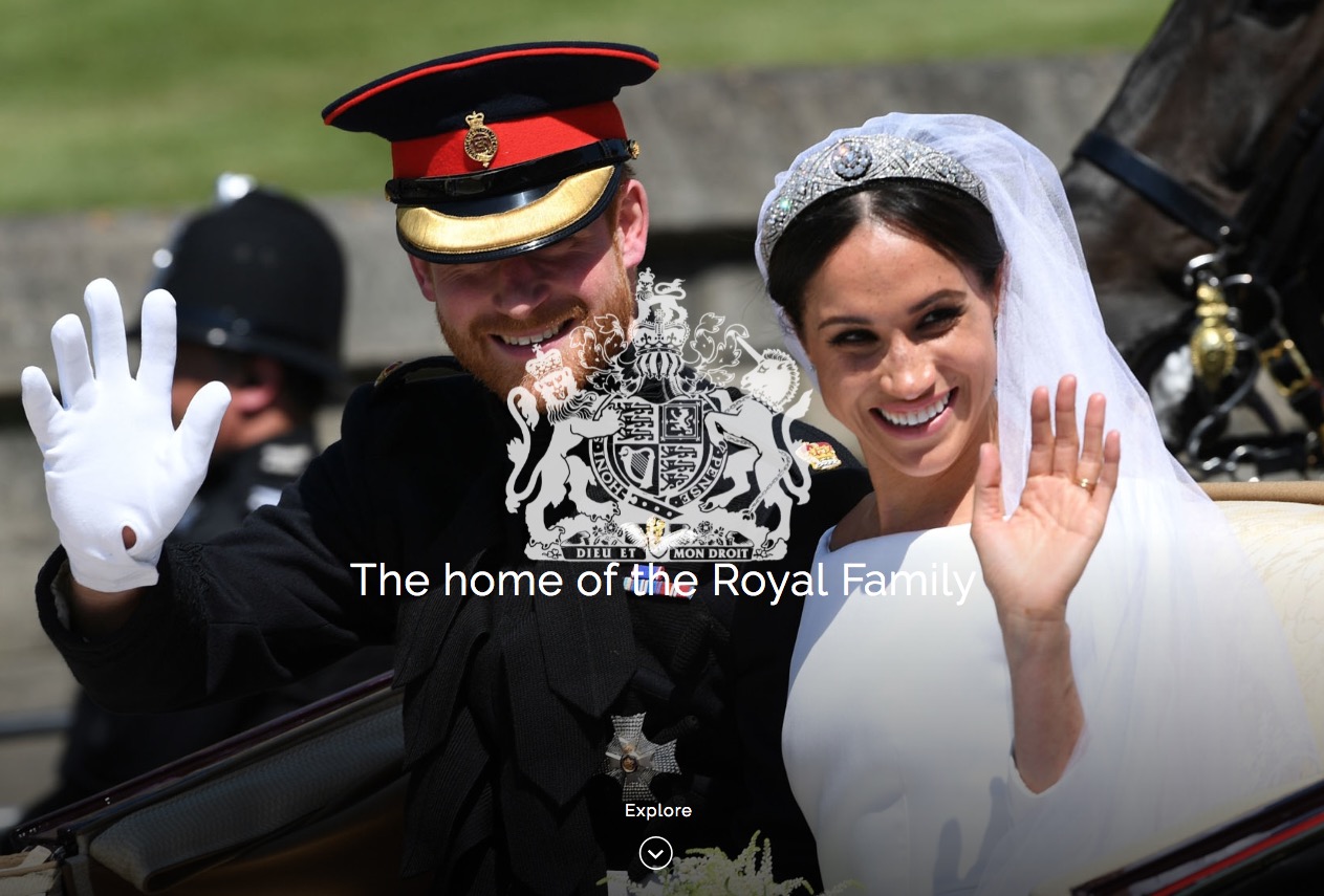 A smiling couple in wedding attire waves while riding in a carriage during a royal event.