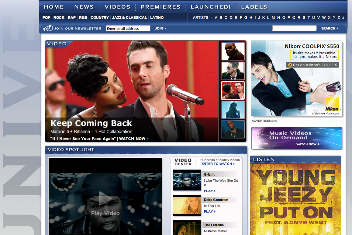 A music website homepage featuring a Maroon 5 and Rihanna collaboration, video highlights, advertisements, and a music player.