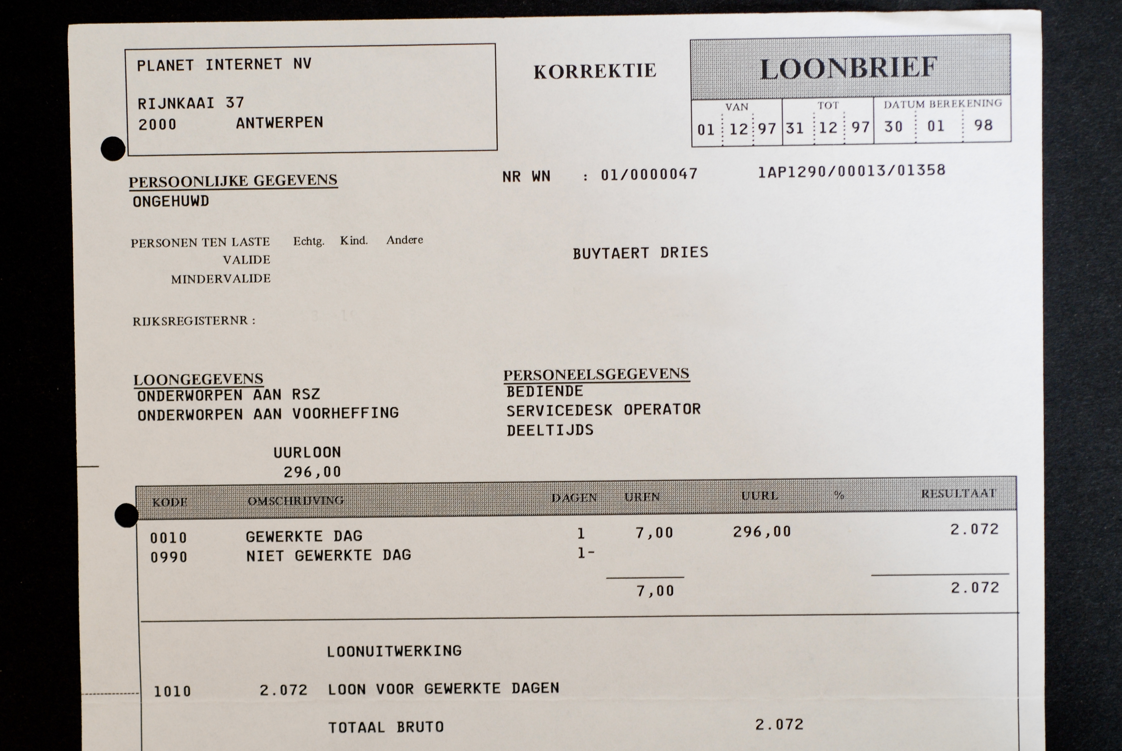 A printed payslip labeled "First Paycheck", showing earnings and deductions for December 1997 to January 1998.