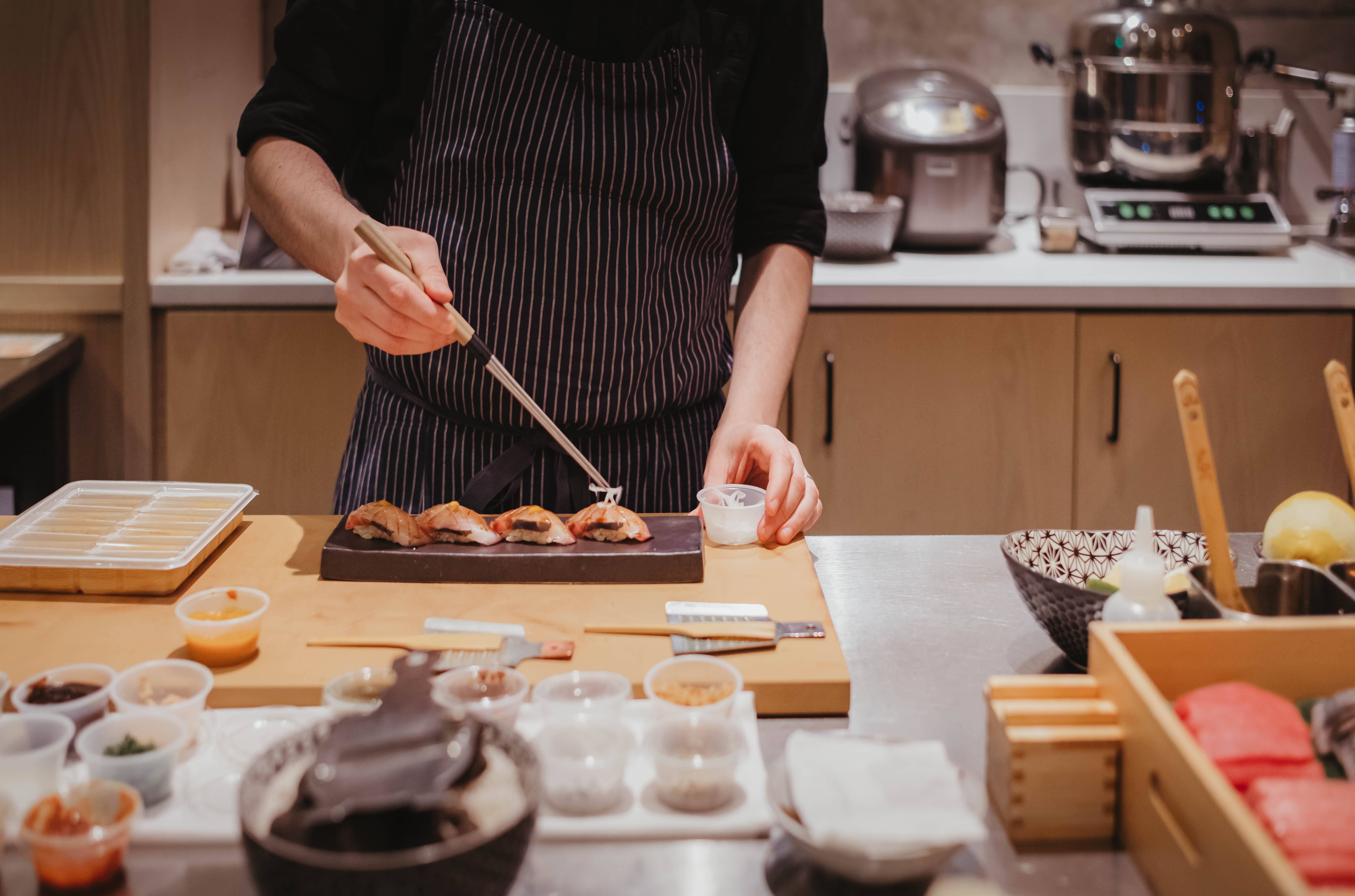 A chef preparing sushi.